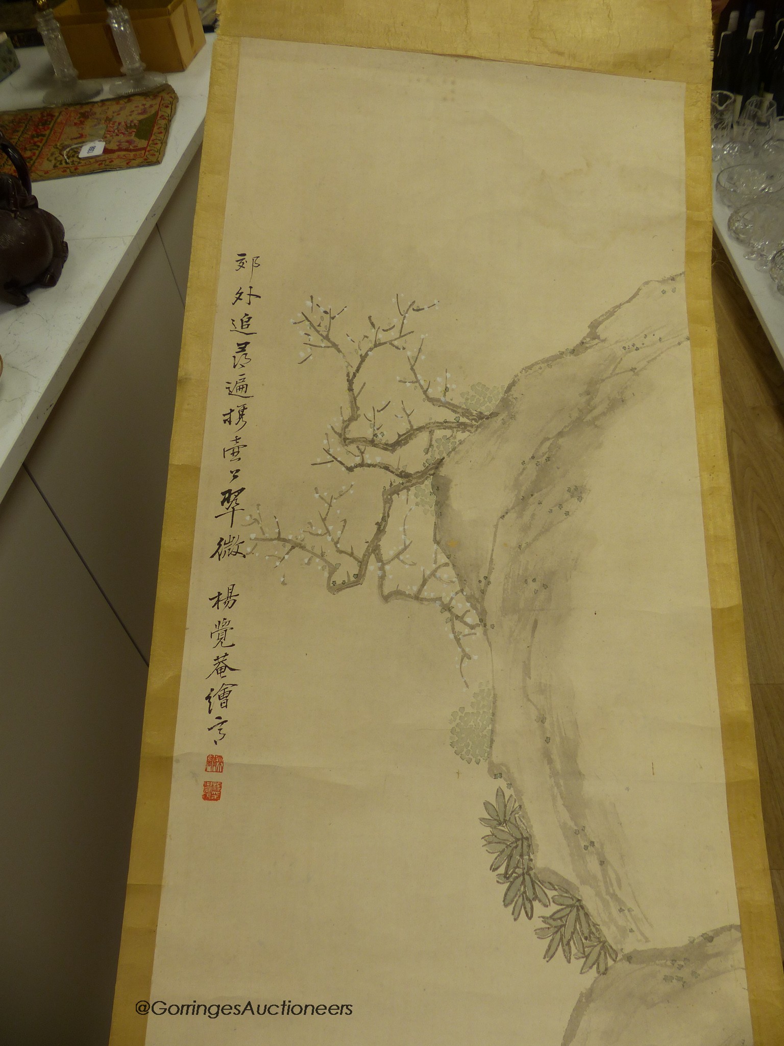 Two late 19th century Chinese scroll paintings, sage in a landscape and buildings in a landscape